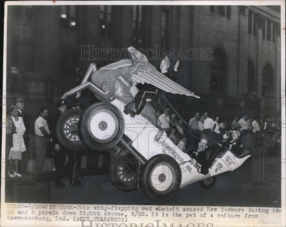 1948 Press Photo Winged float car in parade in NYC on Eighth Ave