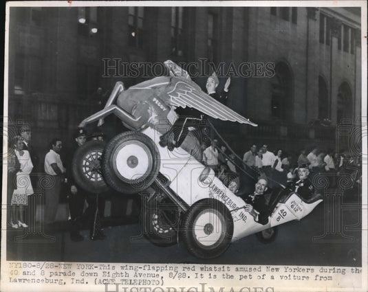 1948 Press Photo Winged float car in parade in NYC on Eighth Ave