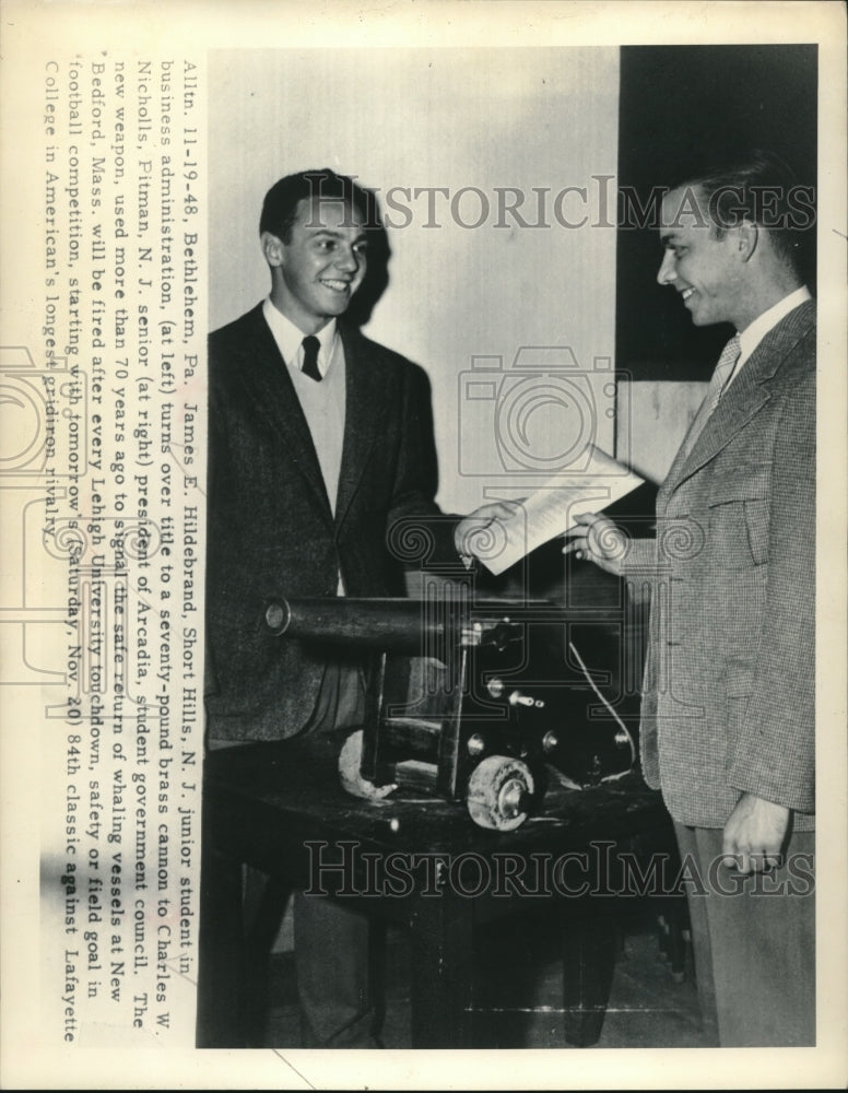 1948 Press Photo Student James Hildebrand Gives Canon to Charles Nicholls- Historic Images