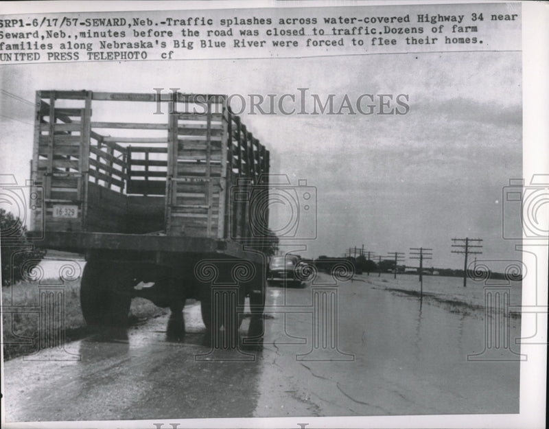 Load image into Gallery viewer, 1957 Press Photo Traffic On Water Covered Highway 34 Outside Seward, NE
