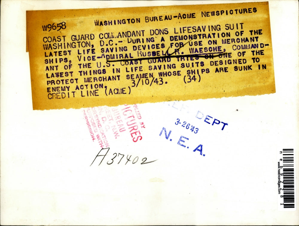 1943 Press Photo Russell Waesche US Coast Guard Life Saving Suit Demonstration