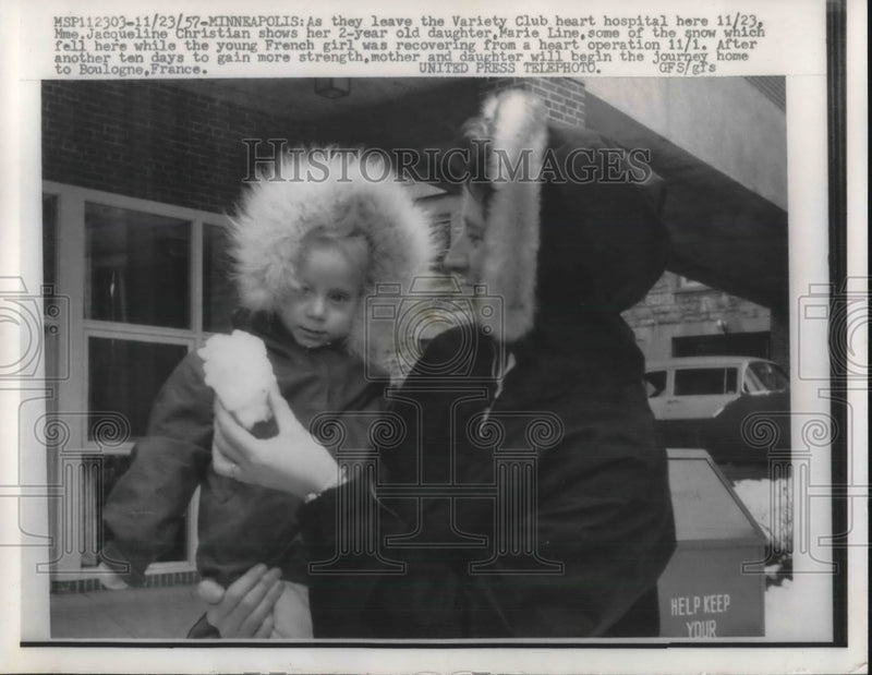 Load image into Gallery viewer, 1957 Press Photo Marie Christian &amp; Parents Return to France Following Surgery
