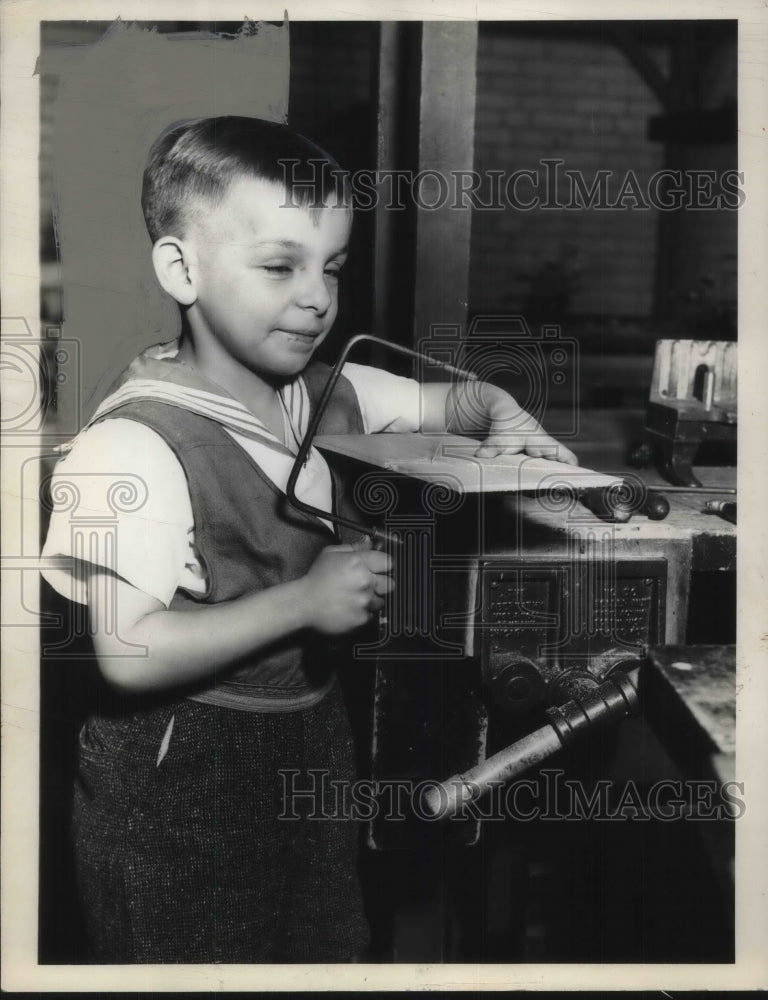 Load image into Gallery viewer, 1936 Press Photo Boy Working On Christmas Toy
