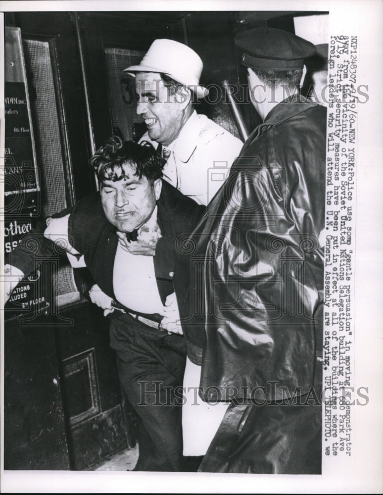1960 Press Photo Demonstrator Being Removed By Police in Front of United Nations