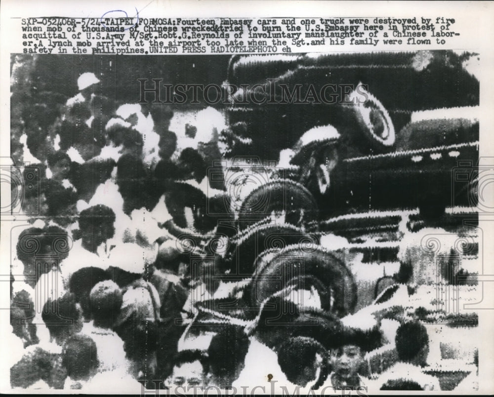1957 Press Photo Chinese burn US vehicle at Enbassy- Historic Images