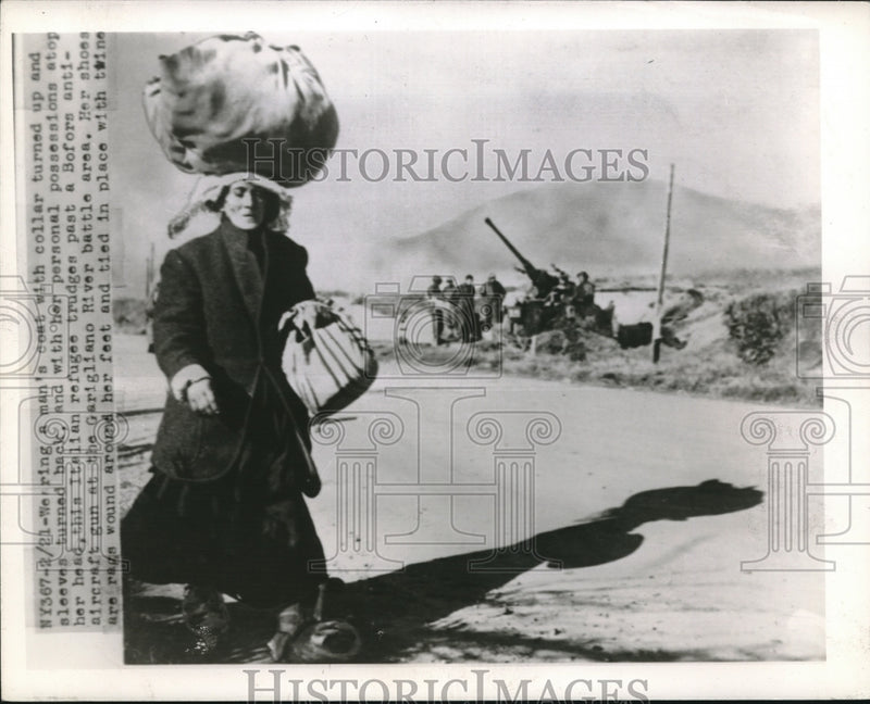 Load image into Gallery viewer, Press Photo Wearing A Man's Coat With Collar Turned Up &amp; Sleeves Turned Back
