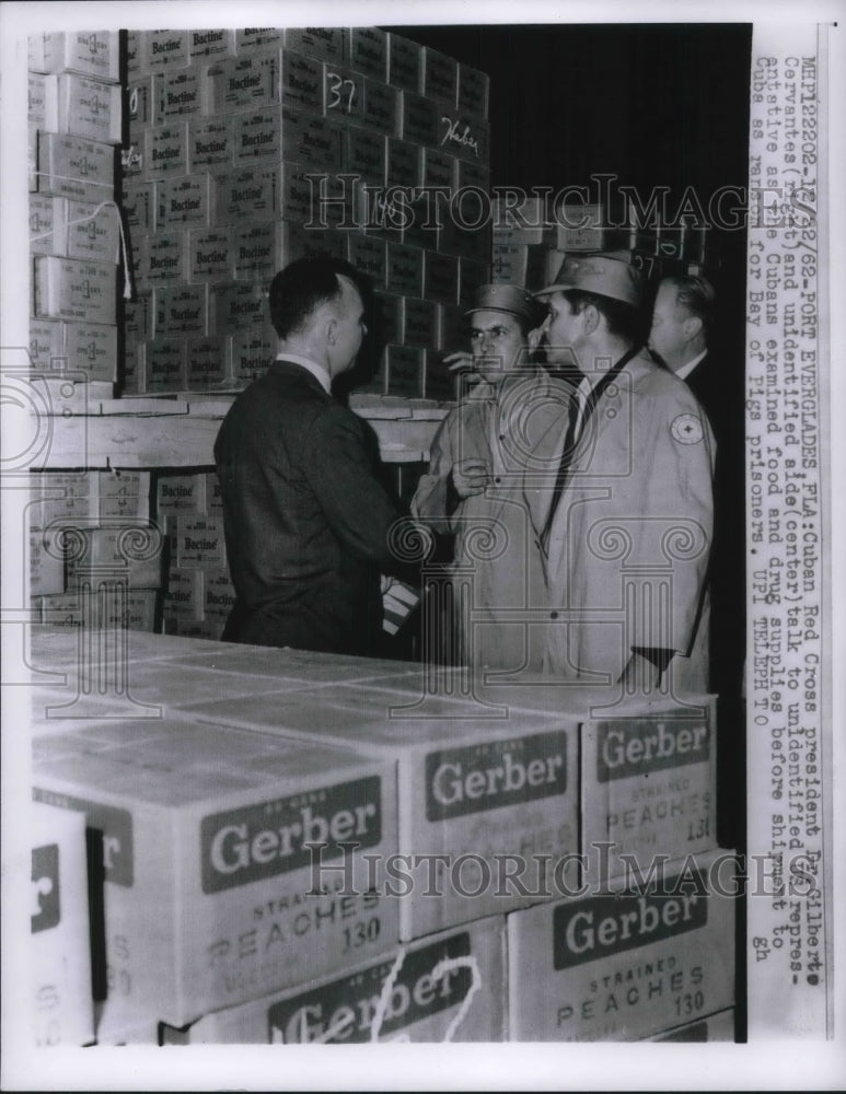 1962 Press Photo Cuban Red Cross President Dr Gilbert Cervates Examining Supplie- Historic Images