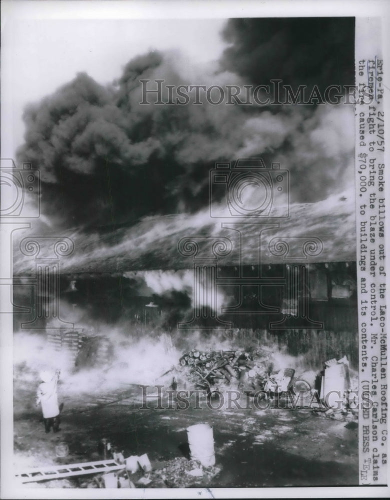 1957 Press Photo Fire at Laco-McMullen Roofing Co. in Erie, PA - nec06632