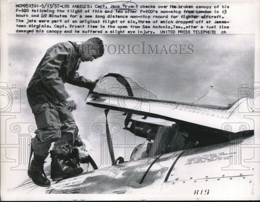 1957 Press Photo Captain Jack Bryant Checks Broken Plane Canopy - nec07461