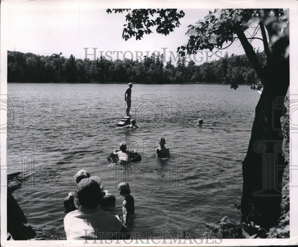 1964 Press Photo Families at Lake Perrault in Michigan having fun