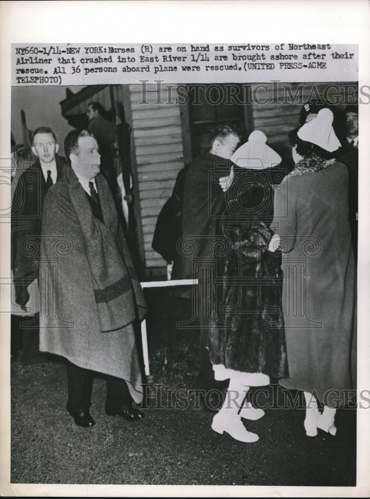 Load image into Gallery viewer, 1952 Press Photo Survivors of Northeast Airliner are brought ashore after rescue
