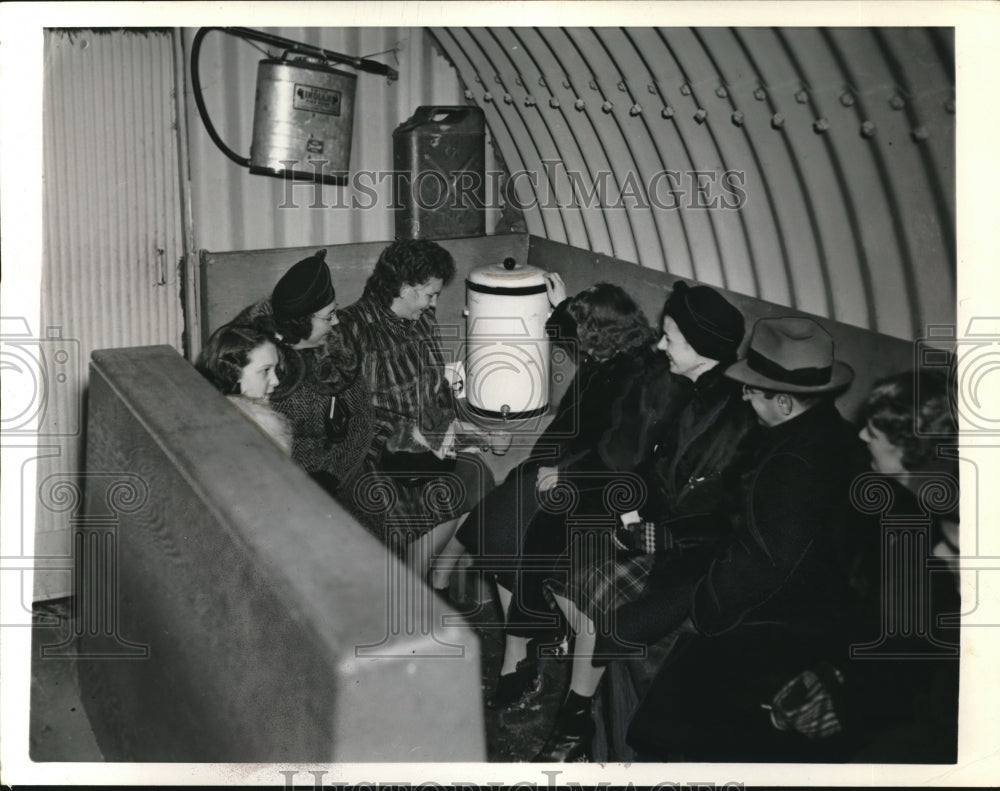 Press Photo People in Air Raid Shelter in Unknown Location