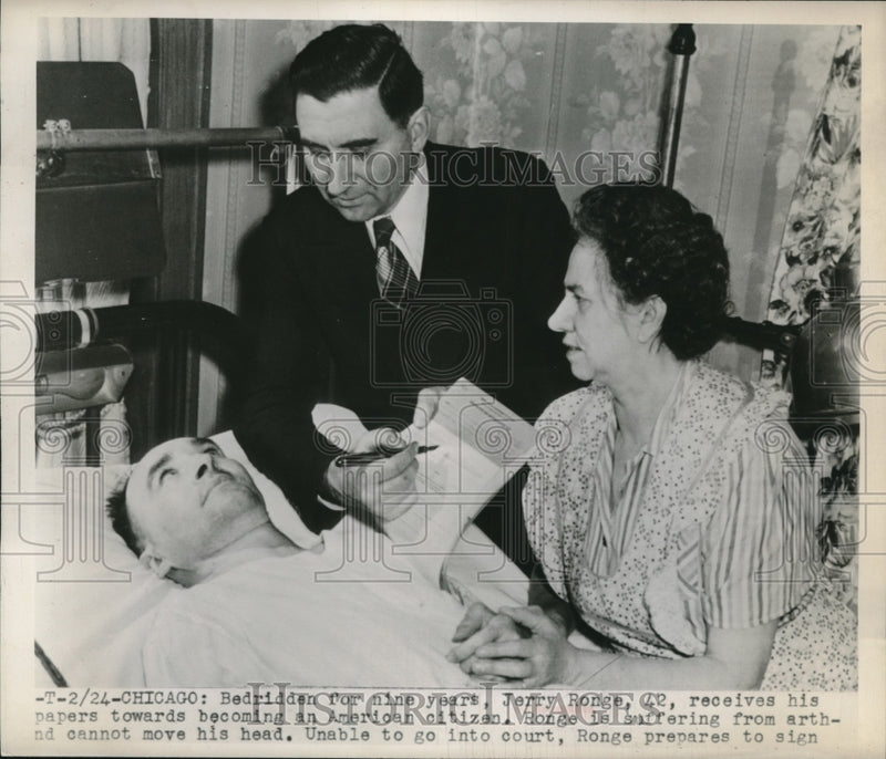 Load image into Gallery viewer, 1948 Press Photo Jerry Ronge Bed ridden for 9 yrs receives citizenship papers
