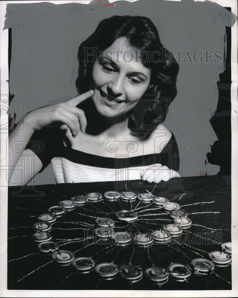 1960 Press Photo Pretty Judith Pardi Examines GE Thermionic Electric Converters