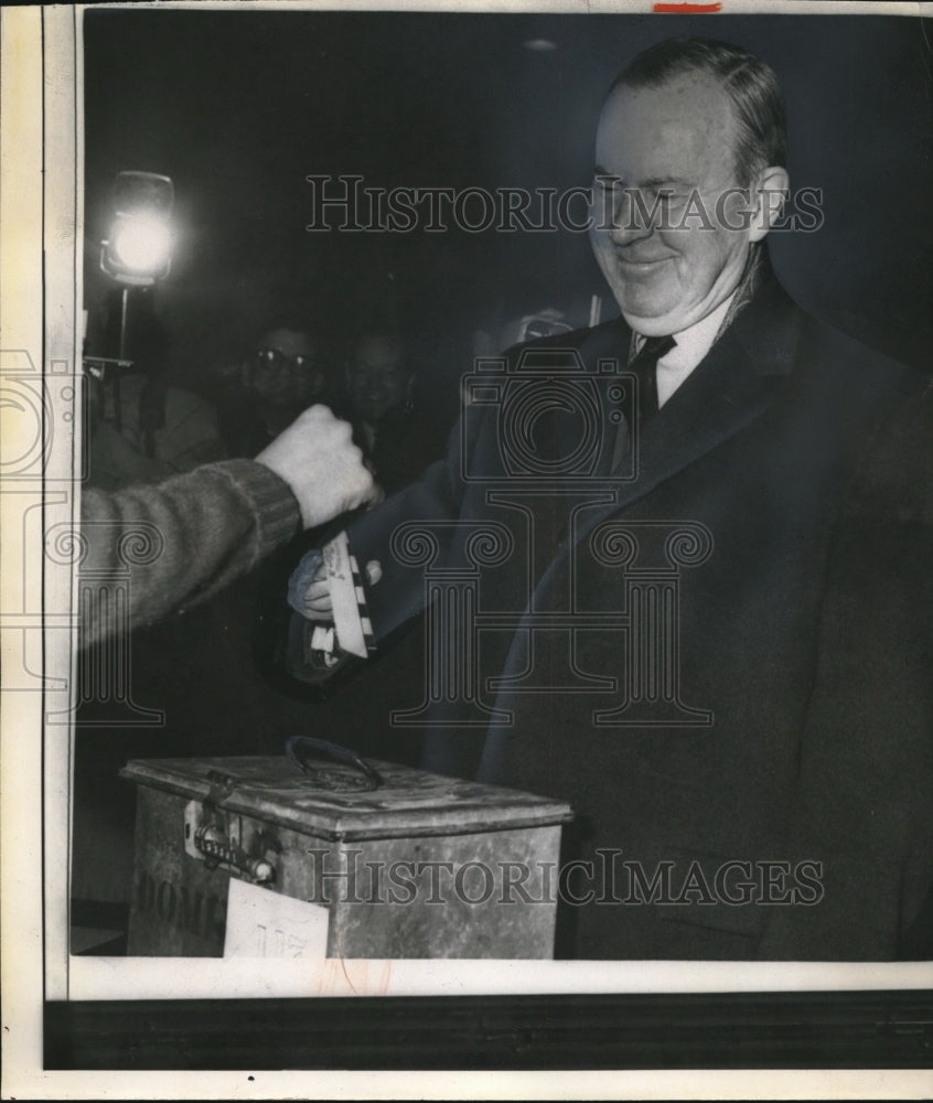 1963 Press Photo Lester B. Pearson Casts Ballot in Box At Polls While Grinning- Historic Images