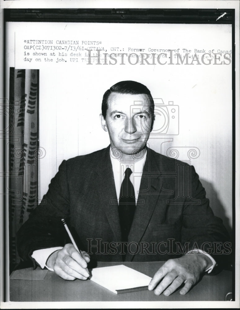 1961 Press Photo Bank of Canada Governor James Coyne Sits At Desk On The Job- Historic Images