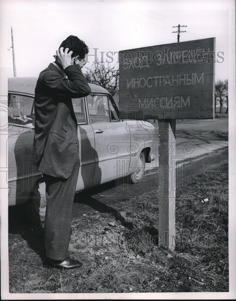 Load image into Gallery viewer, 1953 Press Photo Bewildered Motorist At No Trespassing Sign In West Germany
