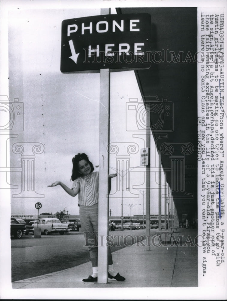 1963 Press Photo Angela Garibaldt, 9, learns you can't trust signs. - nec18491