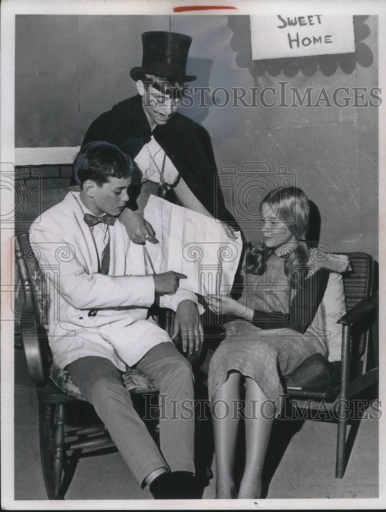 Load image into Gallery viewer, 1968 Press Photo Heroes Jeff Conte And Ann Warner Menaced By School Play Villain
