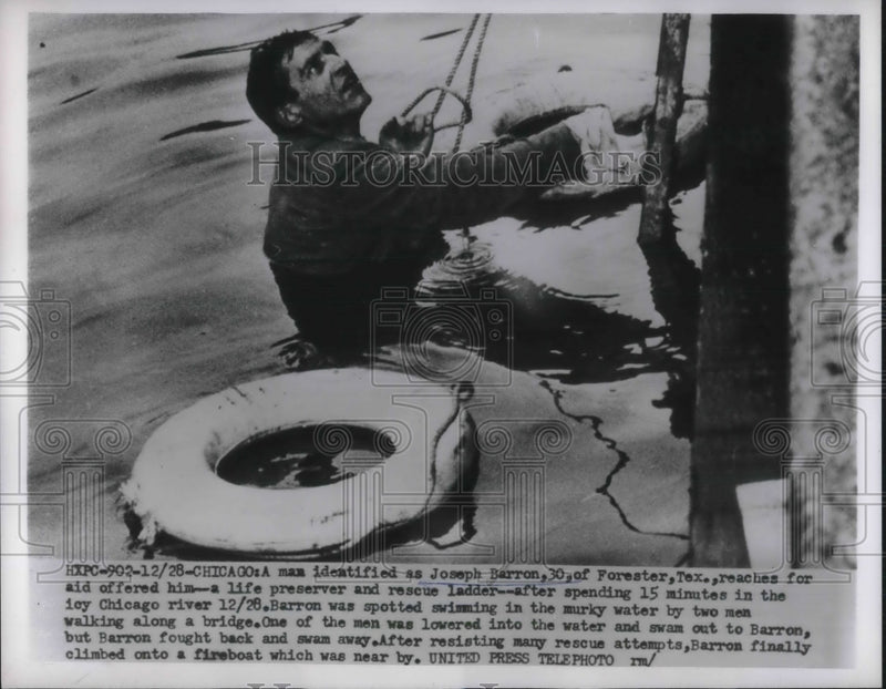 Load image into Gallery viewer, 1955 Press Photo Joseph Barron Reaching for Life Preserver Climbing onto boat
