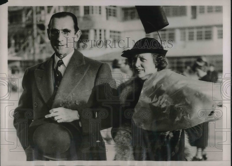 Load image into Gallery viewer, 1937 Press Photo Universal Pictures Head Cheeves Cowdin With Wife In France
