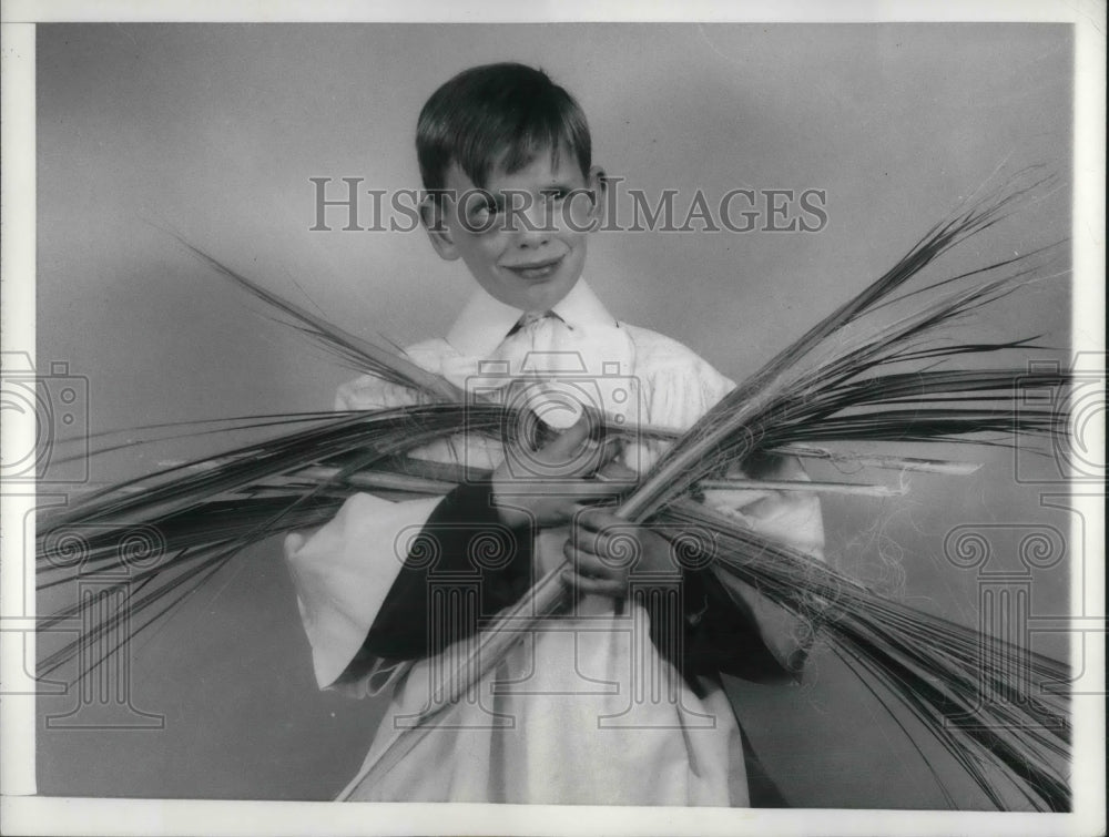 1957 Press Photo Little Choir Boy Pat Callahan Helps In Palm Sunday Preparations