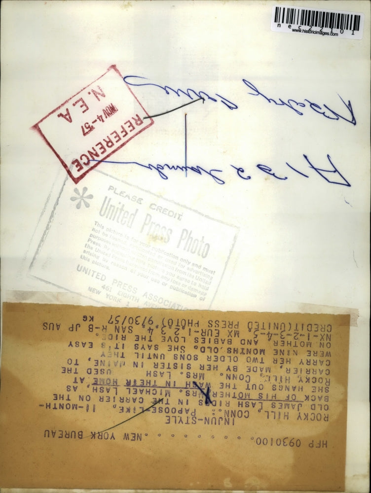 1957 Press Photo James Lash & Mother Mrs. Michael Lash As She Hangs Out The Wash