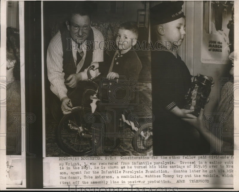 Load image into Gallery viewer, 1946 Press Photo Machinist Tobe Anderson Watches Tommy Wright with Bike
