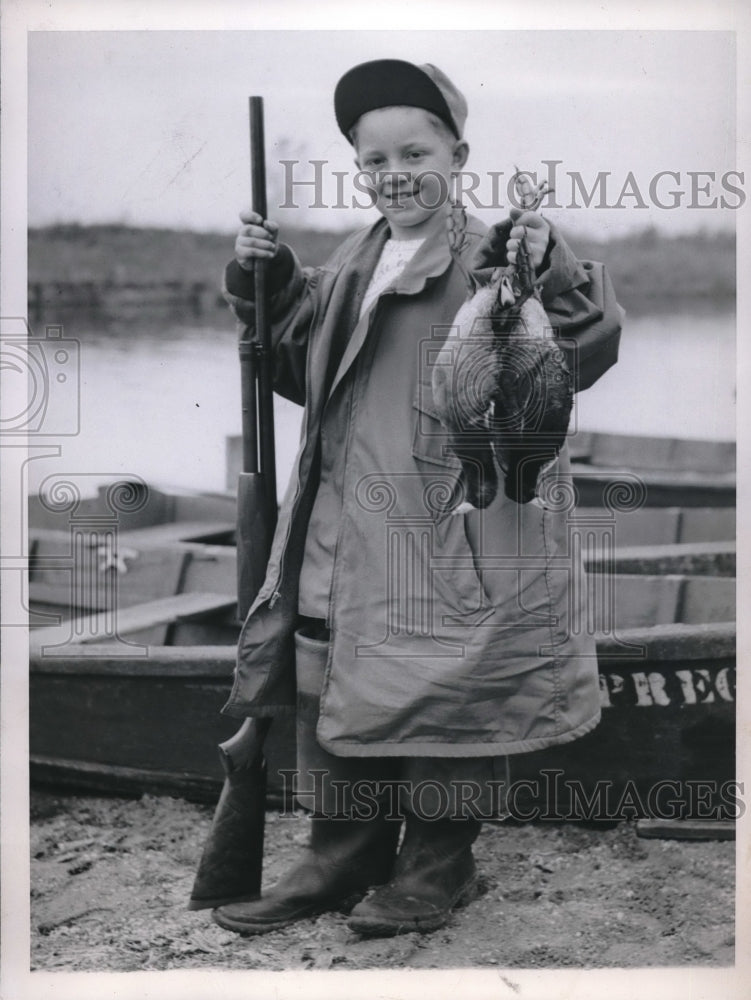 1947 Press Photo Grass Lake, Peter Lehmann, displays his opening day catch.