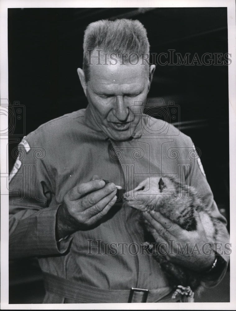 Press Photo Don Stock of Lake County With Baby Possum