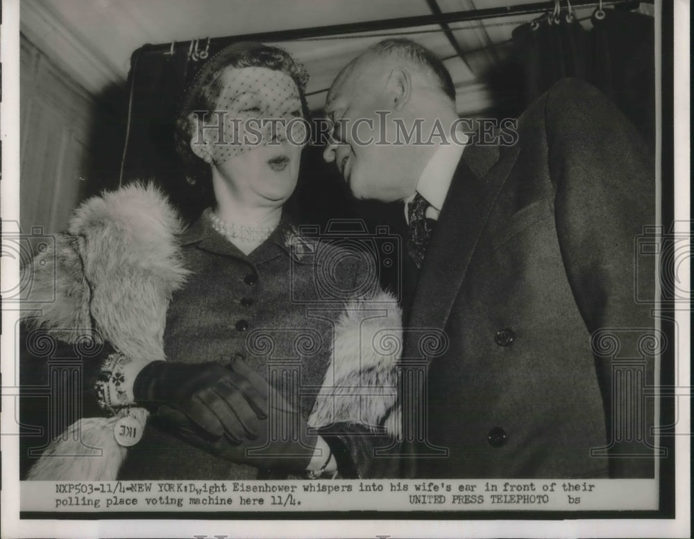 1952 Press Photo Dwight Eisenhower whispers into wife's ear.