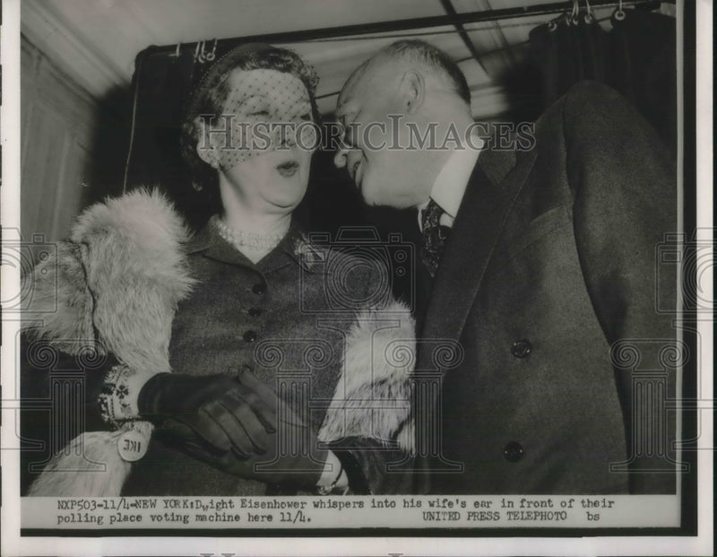Load image into Gallery viewer, 1952 Press Photo Dwight Eisenhower whispers into wife's ear.
