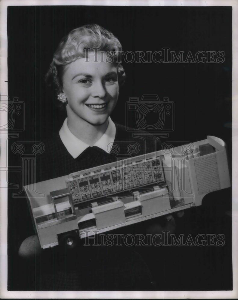 1960 Press Photo Janet Cain Holds Model of GE's Radiation Measurement Trailer