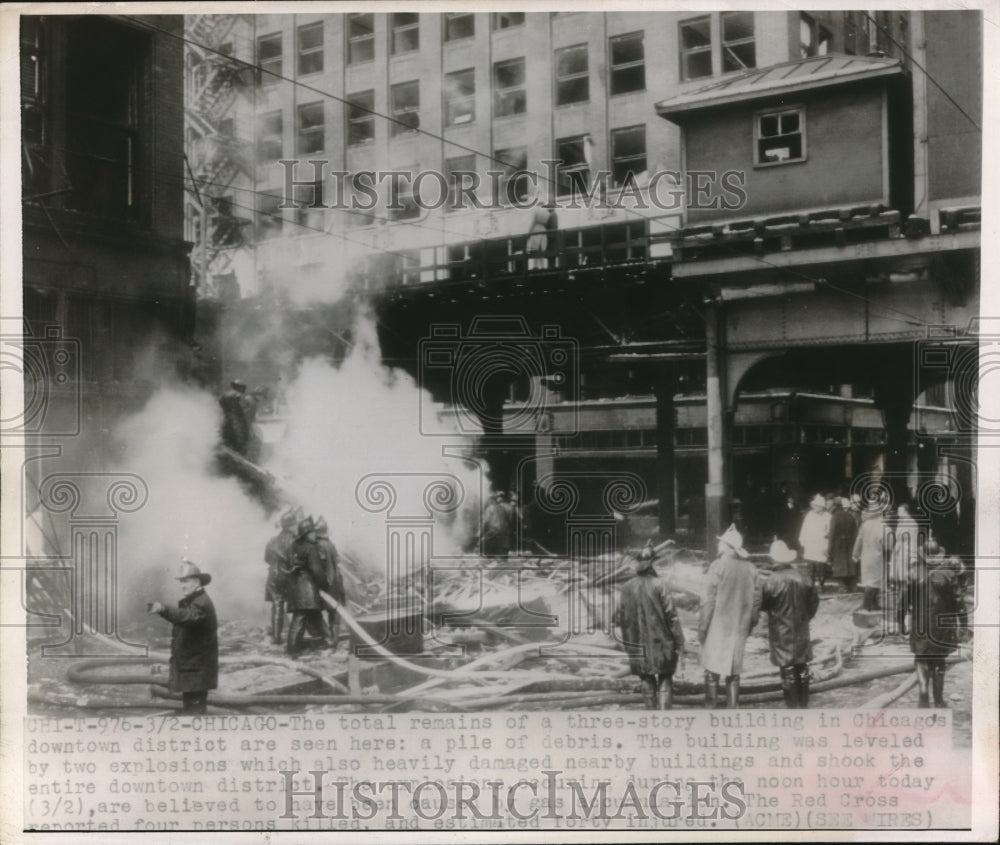 Press Photo Downtown Chicago, building leveled by explosives