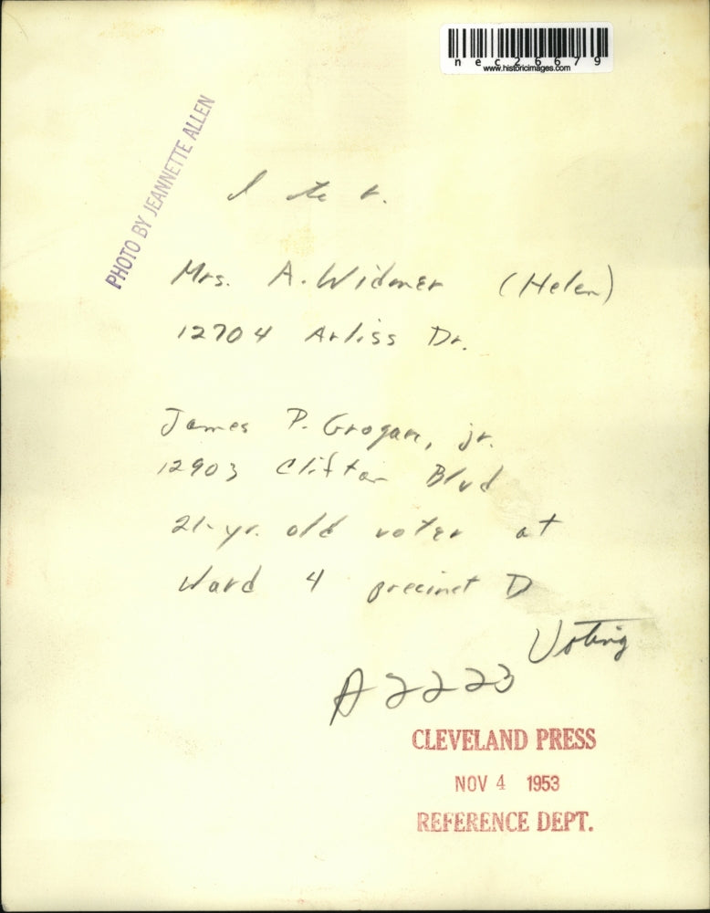 1953 Press Photo Helen Widmer Helps James Grogan Young Voter In Cleveland