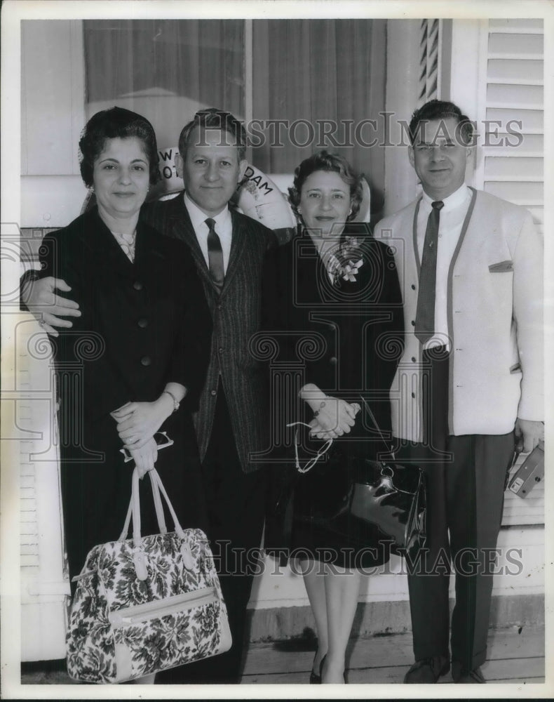 Load image into Gallery viewer, 1962 Press Photo Bohmen and Bookatz Family posing on Holland-America Liner

