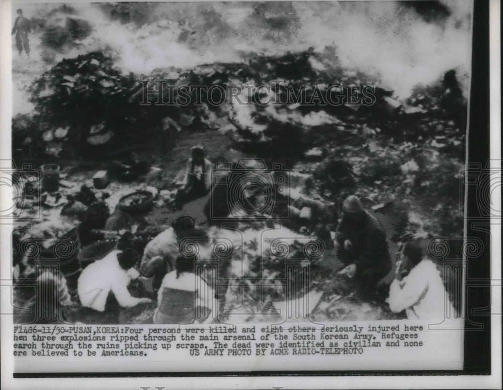 Press Photo Refugees search through the ruins.- Historic Images