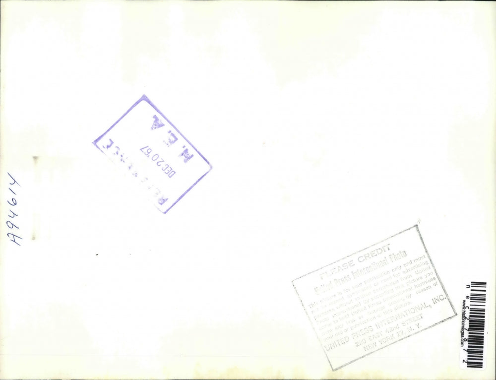 1967 Press Photo Miloslay Rek Kisses the American flag after arrival in LA