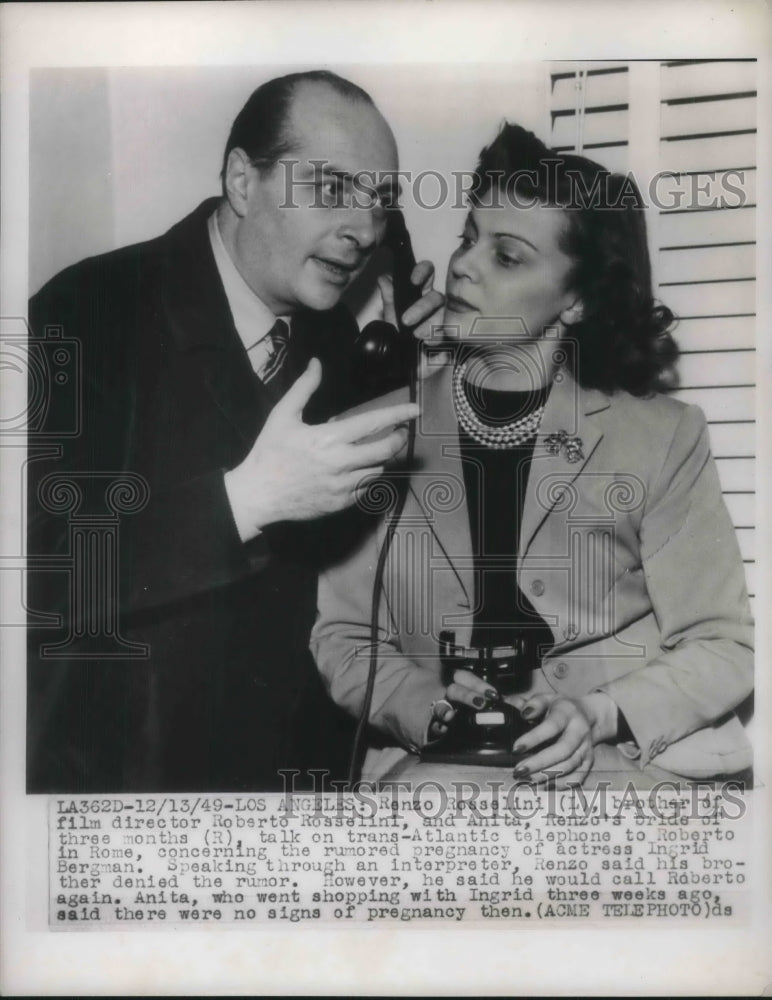 Load image into Gallery viewer, 1949 Press Photo Renzo Rosalini and Bride Anita speaking to Roberto Rosselini

