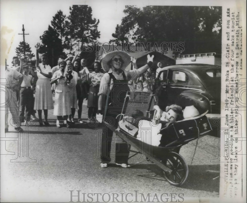 1949 Press Photo Mrs. Roka St. Clair and son wave goodbye as they leave