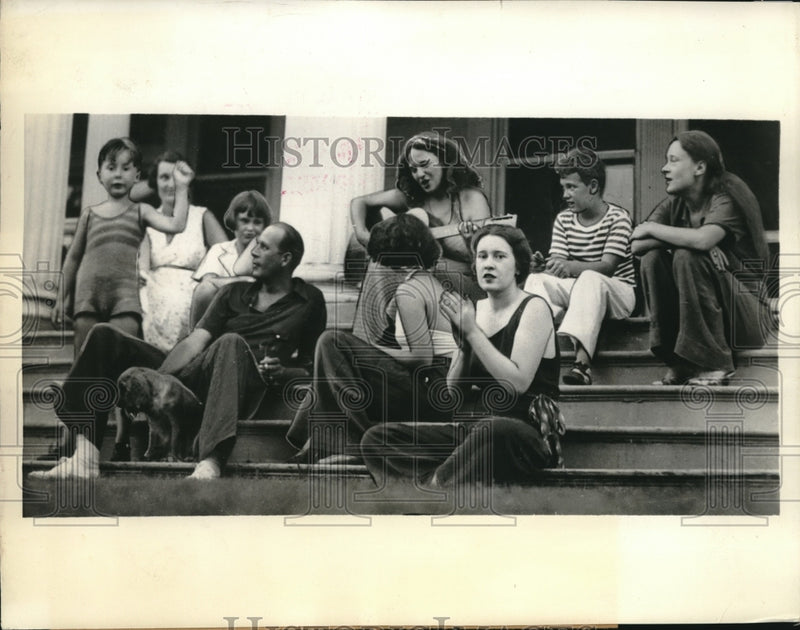 Load image into Gallery viewer, 1935 Press Photo Gloria Vanderbilt Enjoys Party During Vacation with Mother
