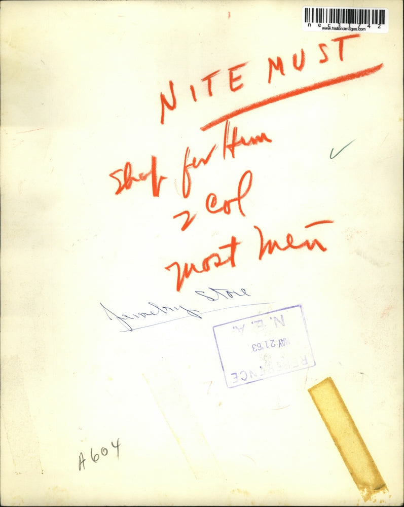 1963 Press Photo customer looking at watches in a jewelry store - nec31742