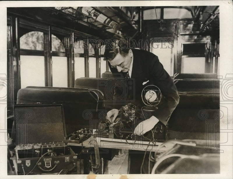 Load image into Gallery viewer, 1931 Press Photo Dr. William Braid doing noise test on a moving train
