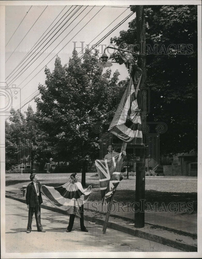 Load image into Gallery viewer, 1939 Workmen hanging up the flags getting ready for the Royal Visit.
