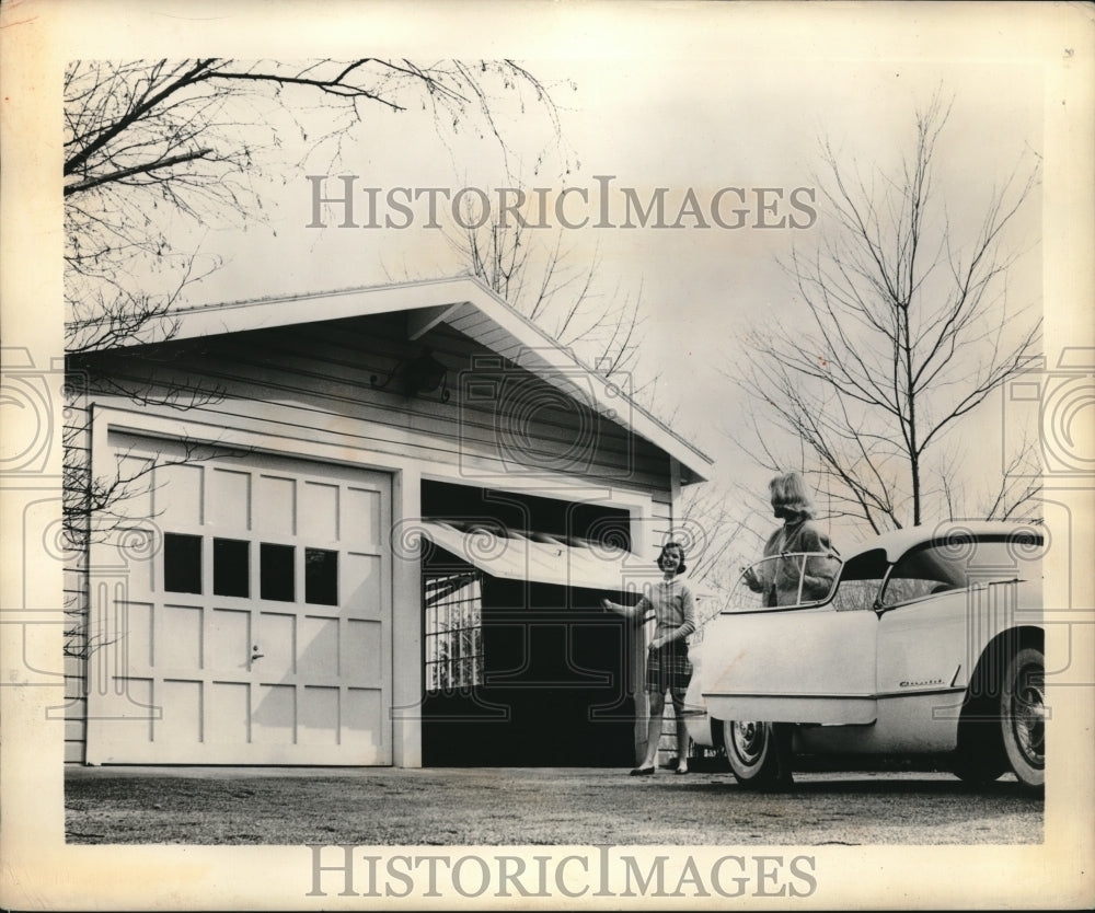 1950 Press Photo Two Women Take Car Out Of Garage