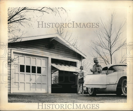1950 Press Photo Two Women Take Car Out Of Garage