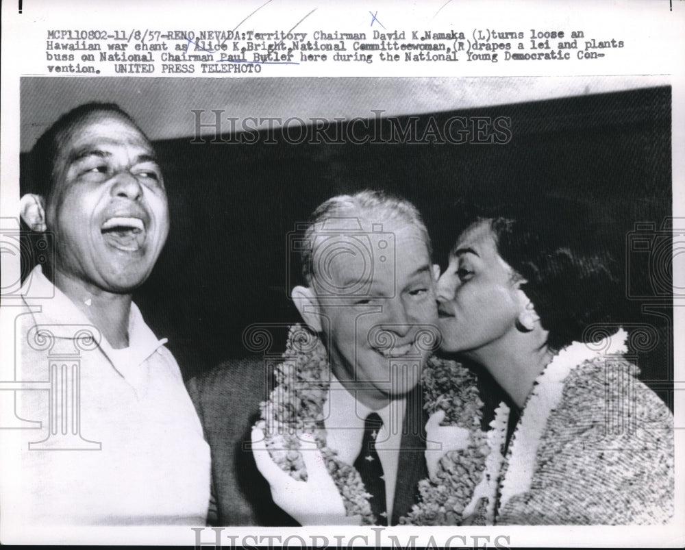 1957 Press Photo David Namaka lets out Hawaiian war chant as Alice Bright puts