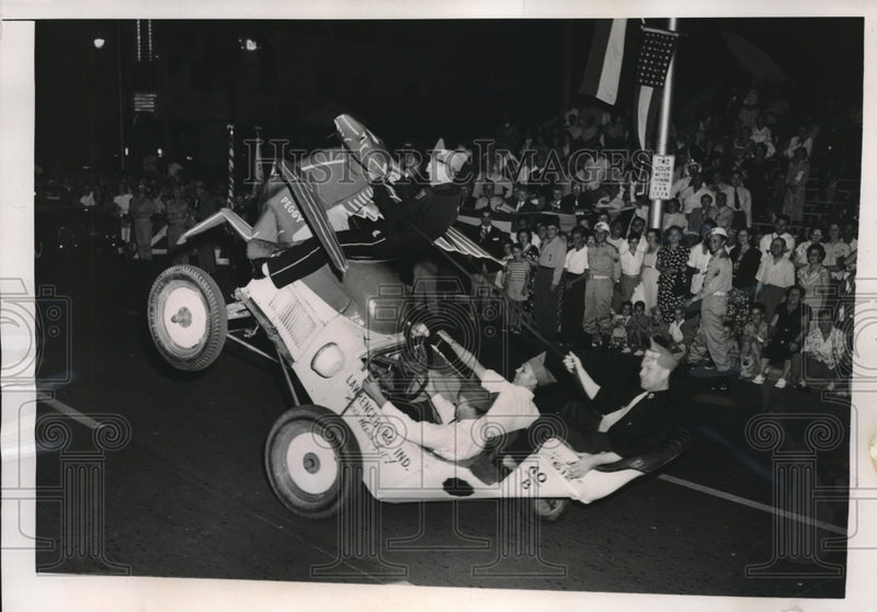 Load image into Gallery viewer, 1948 Press Photo Trick Car Passes Stand At American Legion Forty Eight Parade

