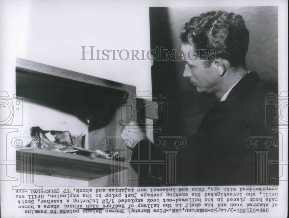 1958 Press Photo Fire Marshall Thurman Nelson home made bomb in school book