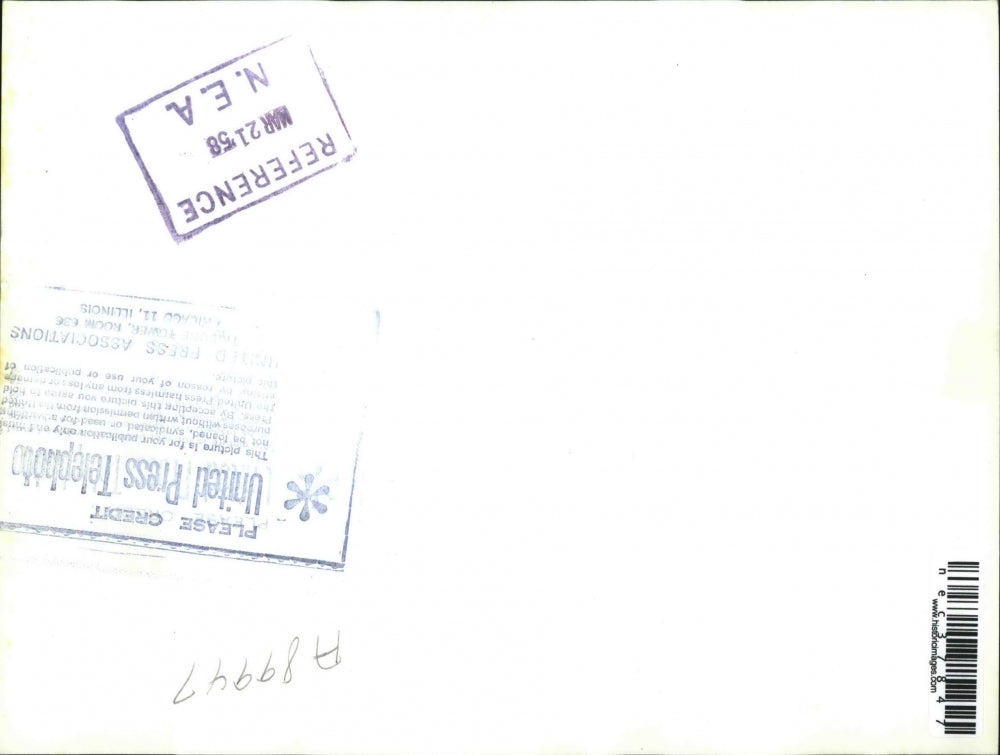 1958 Press Photo Fire Marshall Thurman Nelson home made bomb in school book